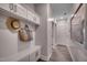 Organized mudroom with built-in storage, hooks, and a bench for convenient entry and exit at 3004 Dog Rose Dr # 309, Durham, NC 27703