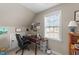 Office featuring a wooden desk, a window, and ample natural light at 323 Windgate Dr, Clayton, NC 27527