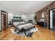A large bedroom area featuring a unique accent wall and modern style bedroom furniture at 3315 Denada Path, Durham, NC 27707