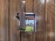 Close up of door with metal security peephole leading to exterior view at 3315 Denada Path, Durham, NC 27707