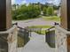 View from the front entrance steps, showing stone details and street views at 3315 Denada Path, Durham, NC 27707