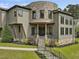 Beautiful home with stone accents, multiple windows and covered entryway creating inviting appeal at 3315 Denada Path, Durham, NC 27707