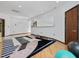 Open fitness area with hardwood floors, a large mirror, and plenty of room for activities at 3315 Denada Path, Durham, NC 27707
