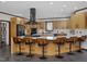 Spacious kitchen with a large island, modern appliances, and barstool seating at 3315 Denada Path, Durham, NC 27707