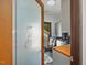 Laundry room with a view of the exterior and a custom designed glass door at 3315 Denada Path, Durham, NC 27707