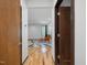 This is a view of the living room with hardwood floors, a rug, and an orange seating set at 3315 Denada Path, Durham, NC 27707