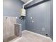 This unfinished room contains a washing station for your beloved pets with gray walls at 3315 Denada Path, Durham, NC 27707