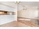 Dining area with view into kitchen and living room at 3325 Tarleton E, Durham, NC 27713