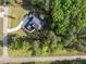 Aerial view of a brand new home with beautiful lawns and lush surrounding trees at 40 Ridgeline Ct # 10, Pittsboro, NC 27312