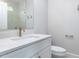 Bright bathroom offers a white vanity, a sink, and brushed bronze hardware at 40 Ridgeline Ct # 10, Pittsboro, NC 27312
