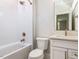 Bathroom featuring updated bronze fixtures and a white shower tub at 40 Ridgeline Ct # 10, Pittsboro, NC 27312