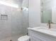 Modern bathroom features a glass-enclosed shower with gray tile and updated fixtures at 40 Ridgeline Ct # 10, Pittsboro, NC 27312