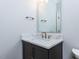 Elegant bathroom features a gray vanity with a white countertop, a sink, and bronze-finished hardware at 40 Ridgeline Ct # 10, Pittsboro, NC 27312