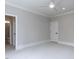 This spacious bedroom has plush carpeting, a ceiling fan, and easy access to the bathroom at 40 Ridgeline Ct # 10, Pittsboro, NC 27312