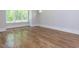 Spacious room with hardwood floors and large windows with natural light at 40 Ridgeline Ct # 10, Pittsboro, NC 27312