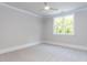 Spacious bedroom is bright with neutral paint, carpet, and thick base molding at 40 Ridgeline Ct # 10, Pittsboro, NC 27312