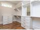 Organized walk-in closet featuring custom shelving, drawers, and ample storage space for clothing and accessories at 40 Ridgeline Ct # 10, Pittsboro, NC 27312