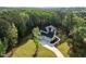 Beautiful new construction home surrounded by lush trees and landscaping with a large drive at 40 Ridgeline Ct # 10, Pittsboro, NC 27312