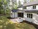 A spacious backyard with a covered patio that has an outdoor grill ready for entertaining and relaxation at 40 Ridgeline Ct # 10, Pittsboro, NC 27312
