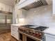 Close-up of a high-end stainless steel oven with a professional hood vent at 40 Ridgeline Ct # 10, Pittsboro, NC 27312