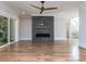 Open-concept living area with fireplace and staircase, perfect for entertaining at 40 Ridgeline Ct # 10, Pittsboro, NC 27312