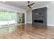 Spacious living room with modern fireplace and sliding glass doors at 40 Ridgeline Ct # 10, Pittsboro, NC 27312