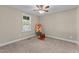 Bedroom with ceiling fan, carpet, and natural light at 4005 Colleen Way, Kittrell, NC 27544