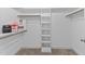 Walk-in closet featuring built-in shelving and racks for optimal organization at 4005 Colleen Way, Kittrell, NC 27544