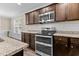 Kitchen with stainless steel double oven and granite countertops at 4005 Colleen Way, Kittrell, NC 27544