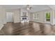 Open living room with fireplace and access to the porch at 4005 Colleen Way, Kittrell, NC 27544