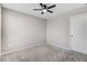 Bedroom featuring neutral walls, plush carpet, a ceiling fan and a door to the hall at 47 Peduncle St, Selma, NC 27576