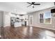 Bright, open kitchen with white cabinetry, stainless steel appliances, and eat in space at 47 Peduncle St, Selma, NC 27576