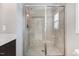 Walk-in shower in the main bath with tile surround, glass door, and a built-in niche at 47 Peduncle St, Selma, NC 27576