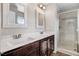 Main bathroom featuring a double sink vanity, a walk-in shower, and modern fixtures at 47 Peduncle St, Selma, NC 27576