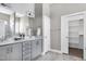 Elegant bathroom featuring double vanity sinks, modern fixtures, and ample storage at 49 Kathy Mae Ct, Angier, NC 27501
