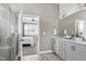 Beautiful bathroom with a walk-in shower, double vanity, and access to main bedroom at 49 Kathy Mae Ct, Angier, NC 27501