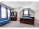 Cozy bedroom features plush carpet, a comfortable bed, and ample natural light from two windows at 49 Kathy Mae Ct, Angier, NC 27501