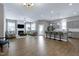 Spacious open-concept with hardwood floors, kitchen island, and fireplace at 49 Kathy Mae Ct, Angier, NC 27501