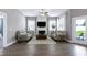 Spacious living room with a fireplace and lots of natural light at 49 Kathy Mae Ct, Angier, NC 27501