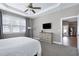 Stylish main bedroom with a ceiling fan, plenty of natural light and neutral-toned decor at 49 Kathy Mae Ct, Angier, NC 27501