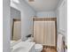 Bright bathroom featuring a sink, toilet, shower and neutral colors at 5547 Sea Daisy Dr, Raleigh, NC 27606