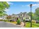 Attractive clubhouse featuring beautiful landscaping and manicured lawns at 5547 Sea Daisy Dr, Raleigh, NC 27606