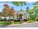 Attractive clubhouse featuring beautiful landscaping and manicured lawns at 5547 Sea Daisy Dr, Raleigh, NC 27606