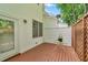 Cozy backyard deck with privacy lattice and a metal table and chairs at 5547 Sea Daisy Dr, Raleigh, NC 27606