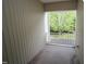 Enclosed patio with a view of landscaped yard at 5927 Hourglass Ct, Raleigh, NC 27612