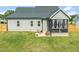 A nice backyard featuring a screened-in porch and outdoor seating at 60 Heart Pine Dr, Wendell, NC 27591