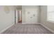 Bedroom featuring carpet flooring, white trim, and closet with double doors at 60 Heart Pine Dr, Wendell, NC 27591