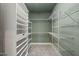 Walk-in closet with extensive shelving and carpeting at 60 Heart Pine Dr, Wendell, NC 27591