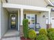 Welcoming front porch with seating, manicured shrubs, and an inviting entrance at 60 Heart Pine Dr, Wendell, NC 27591
