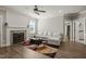 Cozy living room showcasing a fireplace, plush seating, and a colorful rug at 60 Heart Pine Dr, Wendell, NC 27591